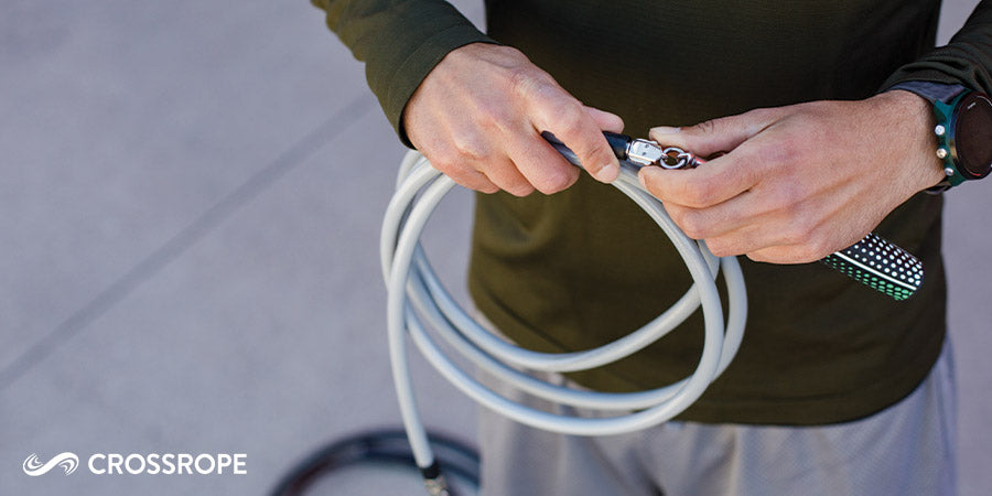 Man holding jump ropes