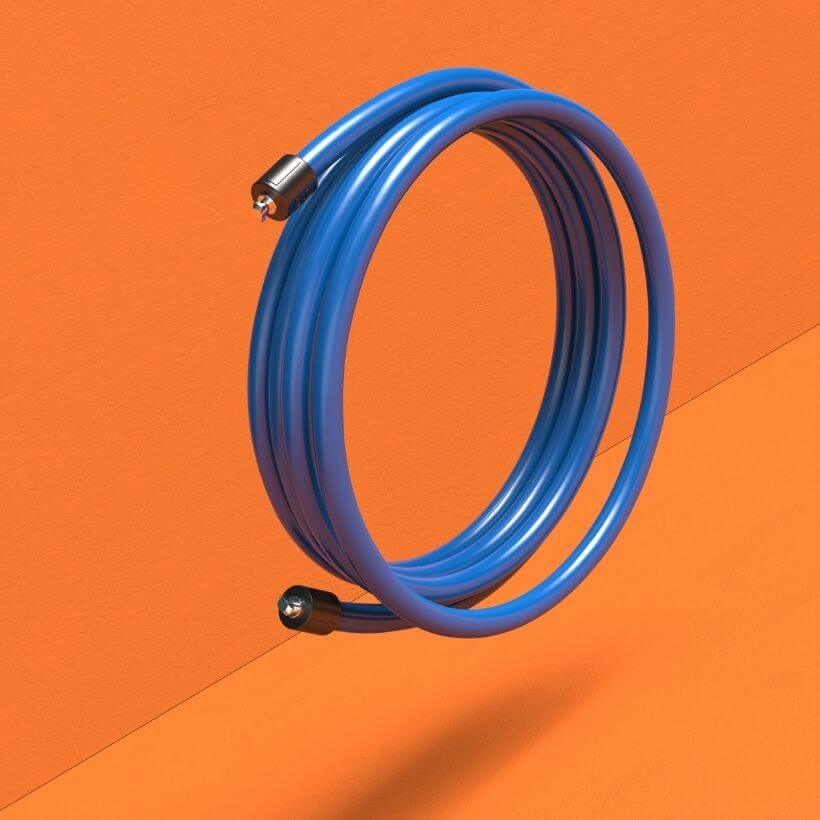 2 LB Heavy Speed Rope A coiled view of the blue 2 LB Speed Pro LE rope on an orange background