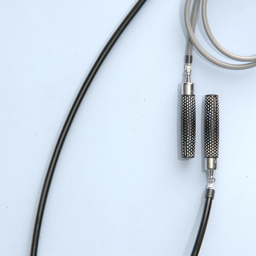 Get Strong V1 (Like-new) Power Handles on the floor with a 1 LB and 2 LB jump rope