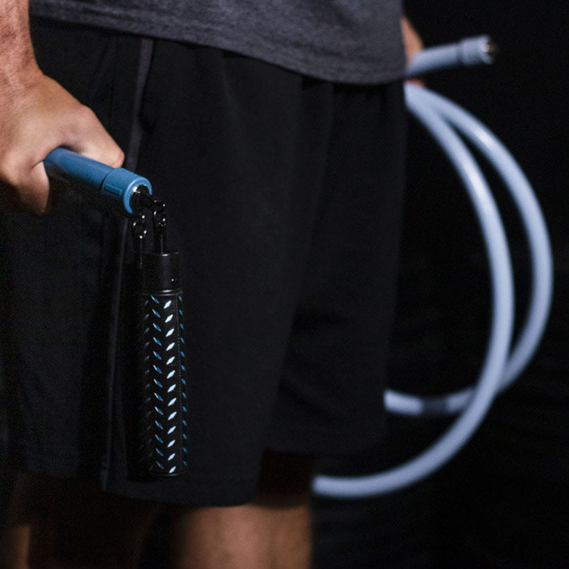 Ultra Heavy Performance Set (V1) Man holding Ultra Heavy LE Handles with 4 LB Ultra Heavy LE Rope
