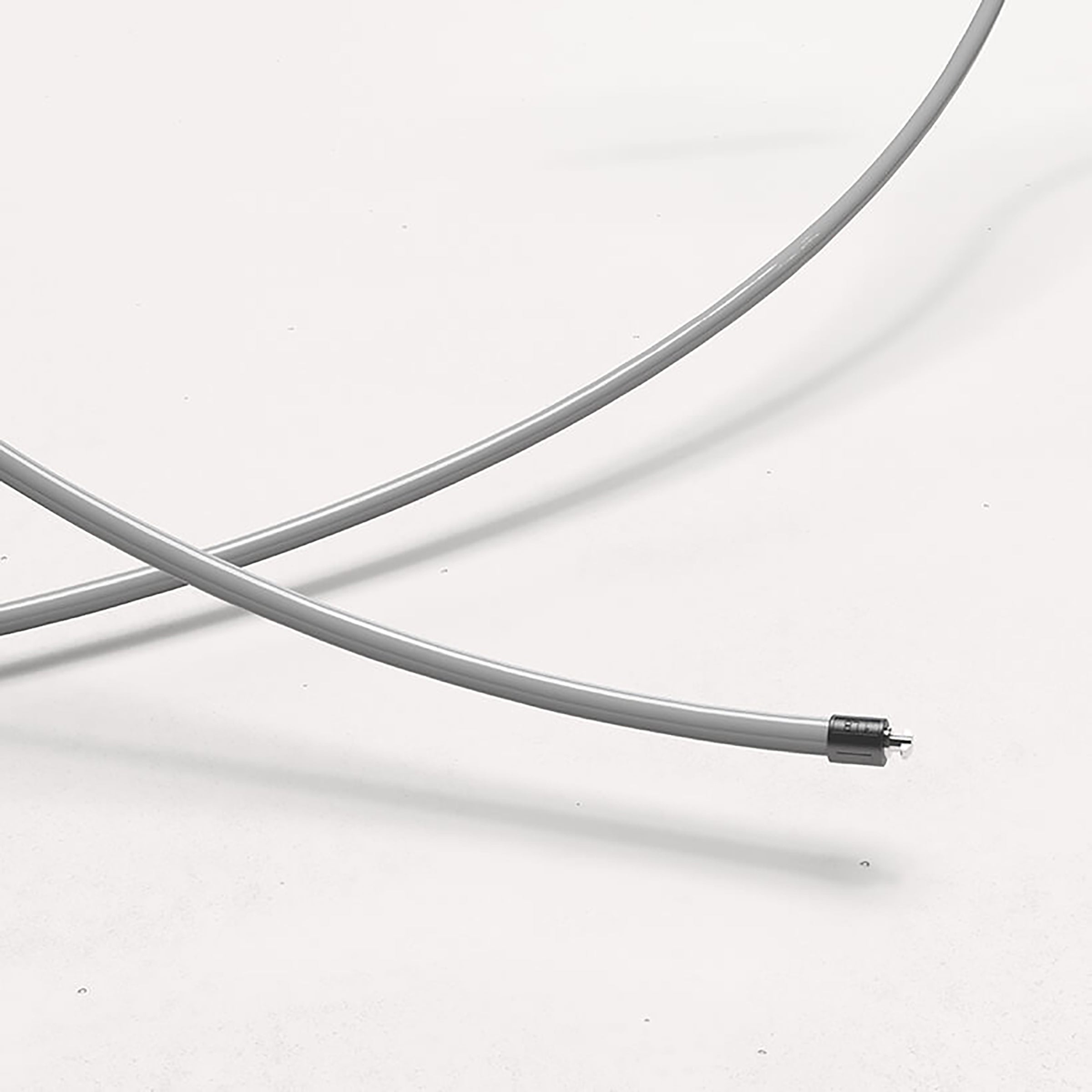 1 LB Heavy Rope Close up view of a gray 1 LB jump rope on a light gray background