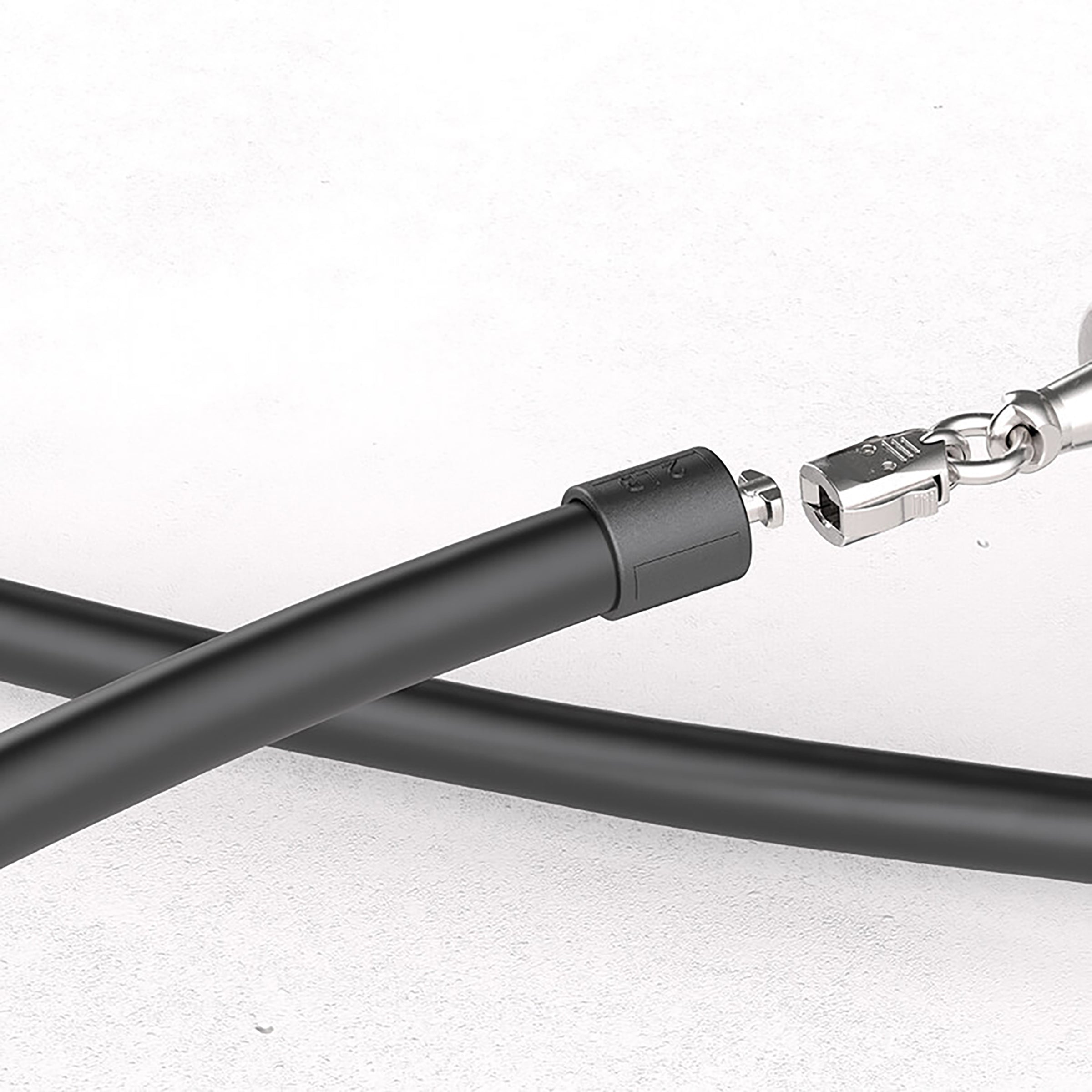 2 LB Heavy Rope Close-up of a black 2 LB jump rope on a white background
