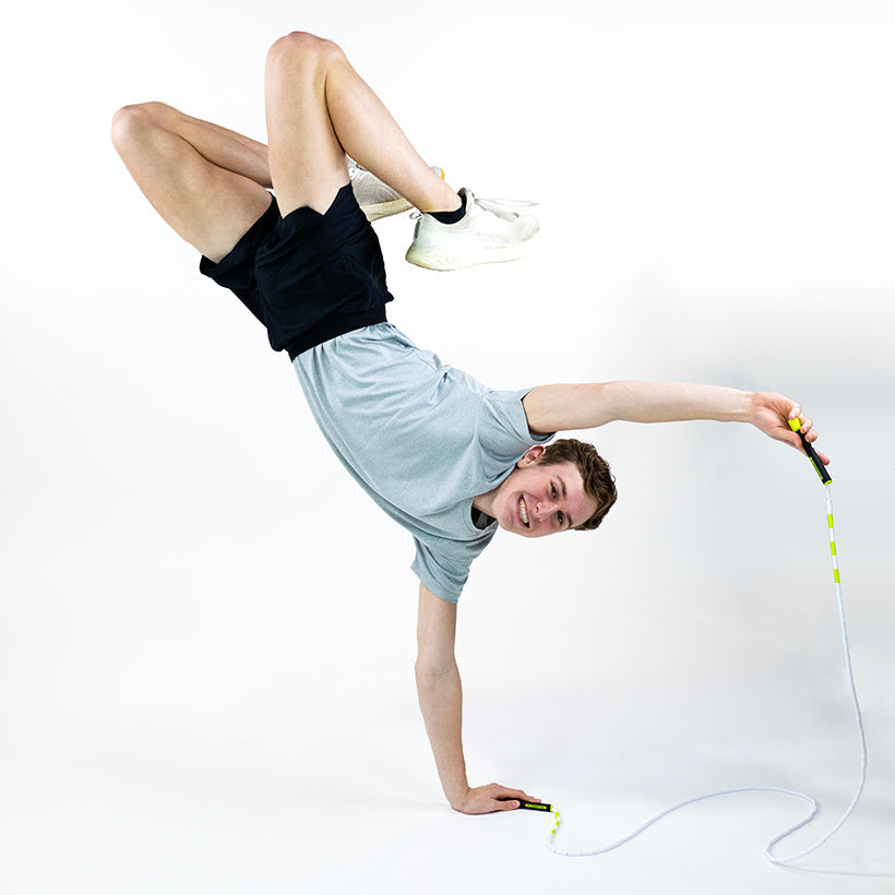 Beaded Rope Man performing a jump rope trick with a Beaded Rope 