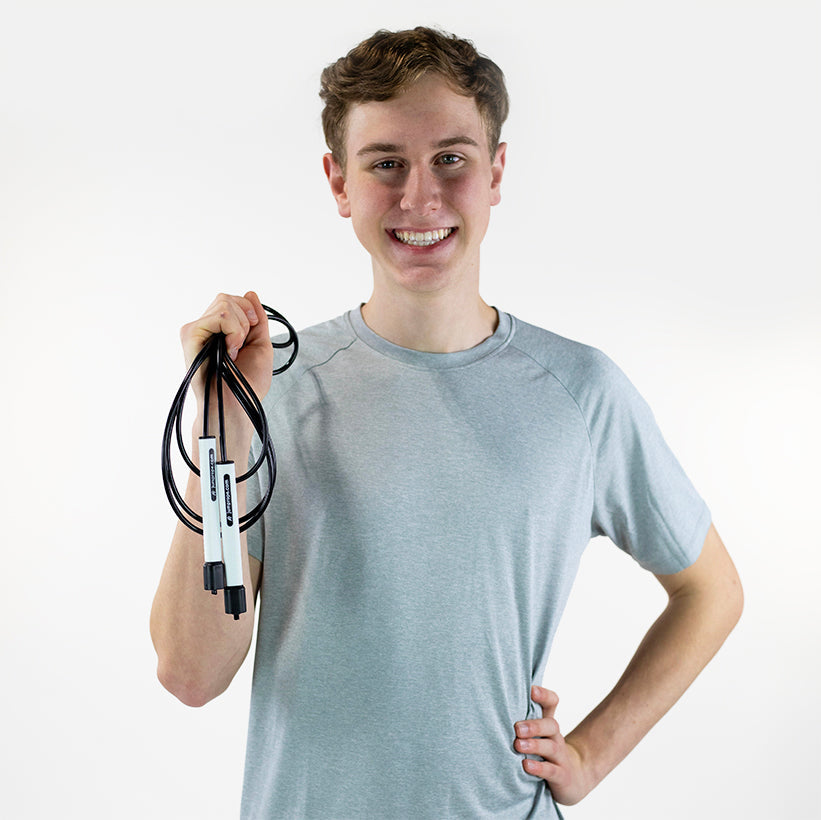Freestyle Rope Man holding a Freestyle Rope from jumprope.com while smiling