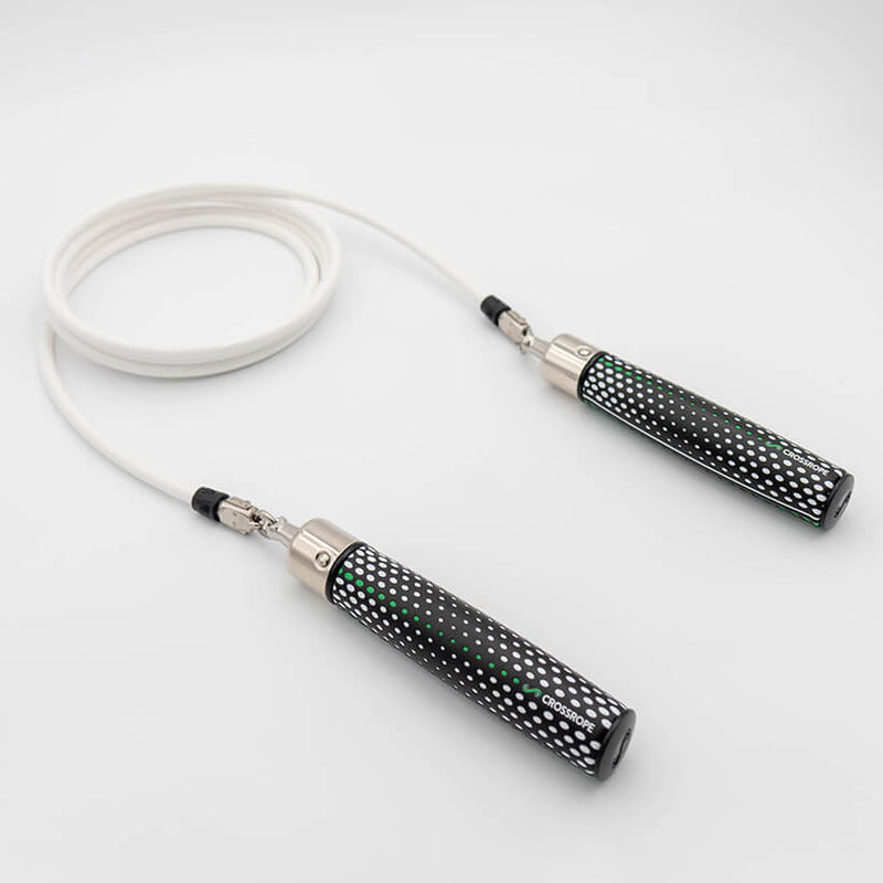 A white 1/2 LB jump rope with black Power handles featuring a white dotted pattern and a small green accent line, displayed on a clean light gray background.