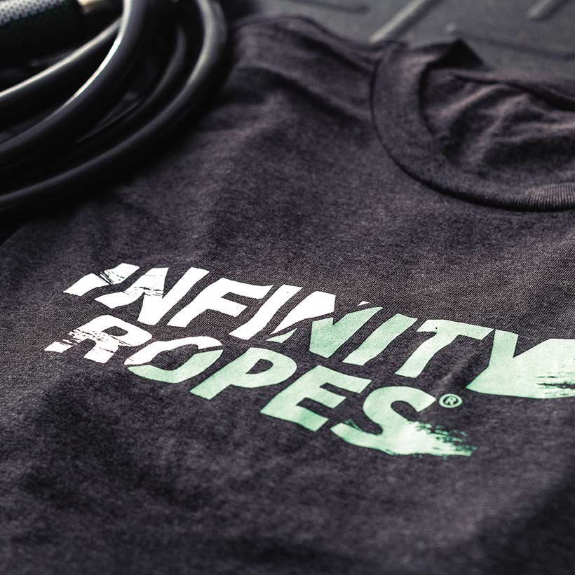 Men's Infinity Ropes Tee A close-up view of the Men's Infinity Ropes Tee Logo